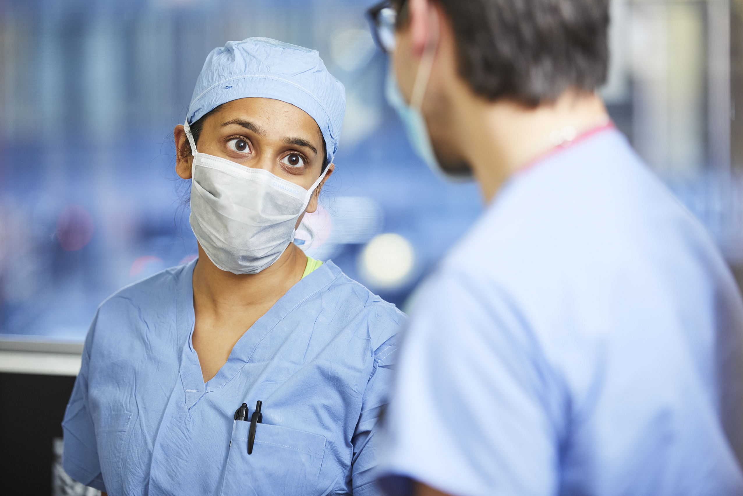 Two OMFS staff members speaking Two OMFS staff members speaking